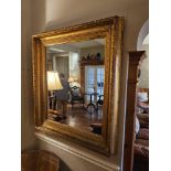 A substantial gesso and giltwood mirror with Acanthus Leaf and Anthemion Decoration 107 x 125cm