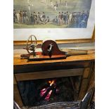A mid Victorian mahogany and brass mechanical fire bellows of typical form, mounted on a wood