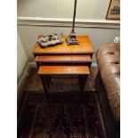 Regency style nest of three tables in mahogany crotch mahogany veneers, satinwood stringing outlines