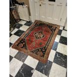 Small Hand Knotted Persian Wool Rug. Elegant hand knotted carpet with predominantly red field with