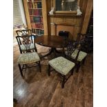 Regency style Mahogany Pedestal Oval Top Dining Table raised on elegant turned pedestal base