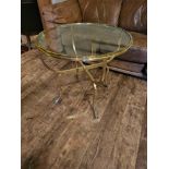 Jensen Style brass and glass coffee table the circular top raised on hoof feet 65cm diameter x 65cm
