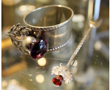 Silver pickle fork and silver plated napkin ring, both decorated with Scottish Thistle