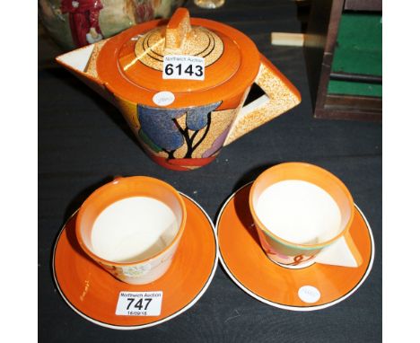 Art Deco teapot and pair of cups and saucers
