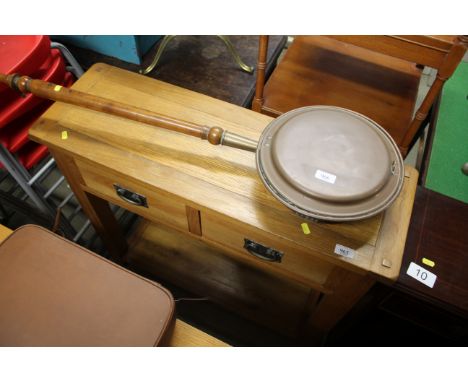 A light oak two drawer side table with under tier