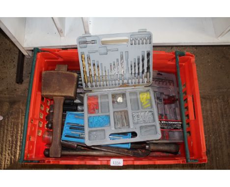 A tray box containing various tools to include a rubber mallet, cased set of drill bits and a twelve piece tap and dye set et