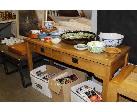 A light oak two drawer hall table 