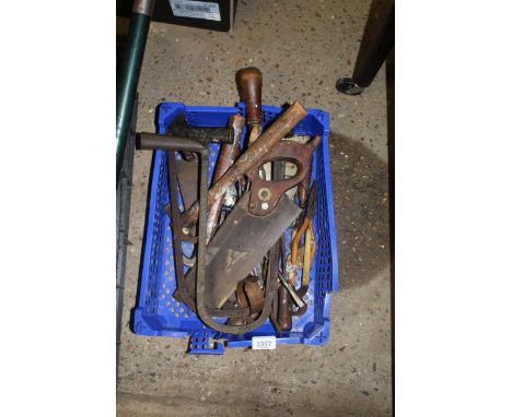 A small quantity of tools to include hand saws, hammers etc