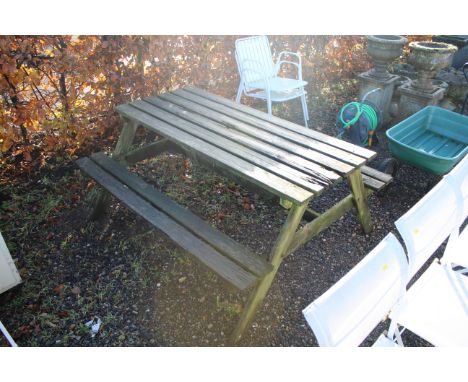 A wooden picnic bench