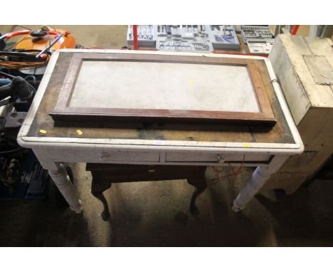 A white painted wooden desk with twin single drawers, a marble splash back and a small wooden size table with hinged lid