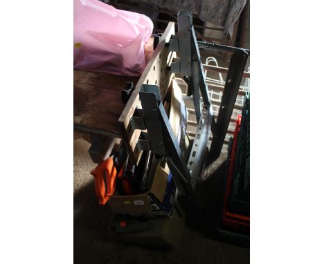 A metal folding work bench