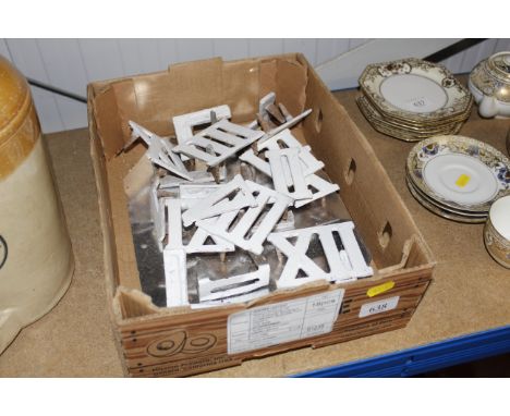 A box of clock golf numbers