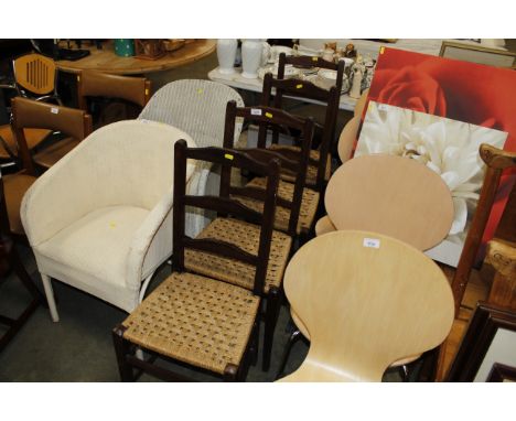 A set of four string seat ladder back dining chairs