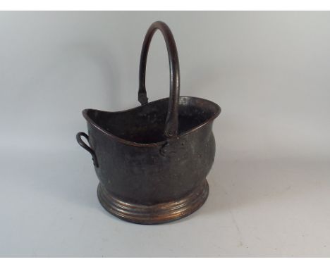 A War Department Copper Helmet Shaped Coal Scuttle, 1962