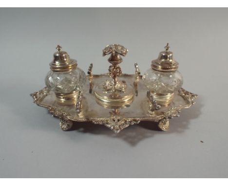 A Silver Plated Desk Top Ink Stand by Ashberry and Sons, Having Two Glass Inkwells in Centre, Removable Candle Stick, 33cm Lo