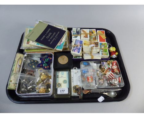 A Tray of Collectables to Include Enamel Badges, Tea Cards, Tea Card Albums, Military Buttons Etc 