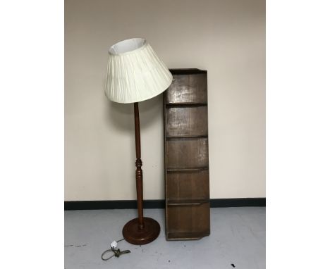 A standard lamp and shade together with a twentieth century desk top filing rack 