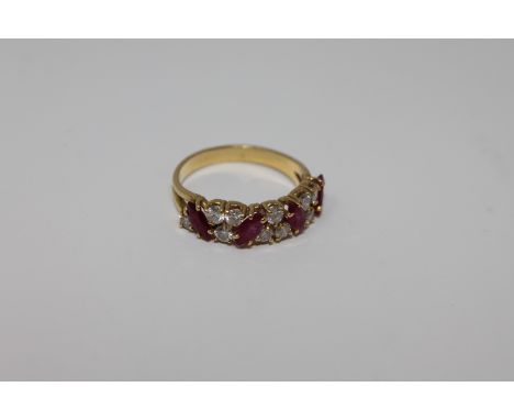 An 18ct gold ruby and diamond ring
