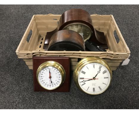 A box of two mantle clocks, contemporary wall clock, two circular ships style clocks