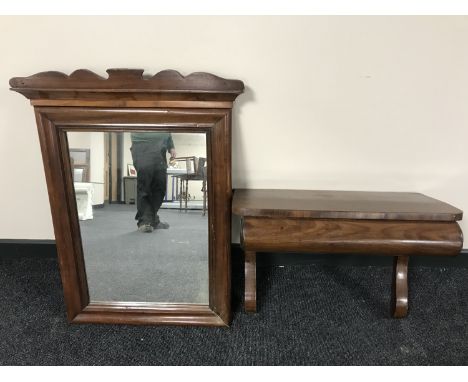 A Victorian mahogany wall mirror with shelf