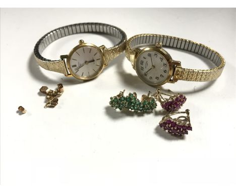 A box of two pairs of 9ct gold earrings together with two Lady's Rotary wrist watches and a small quantity of 9ct gold scrap