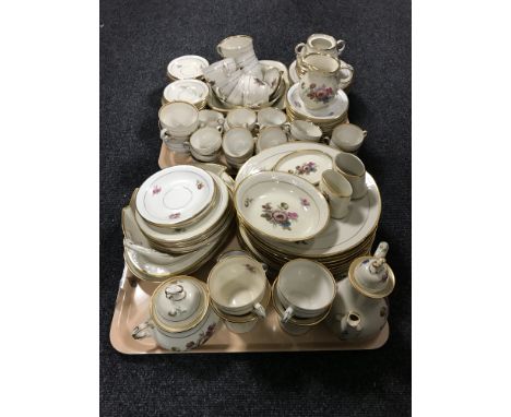 An extensive KPM German tea and dinner service with floral and gilt decoration CONDITION REPORT: All pieces with typical surf