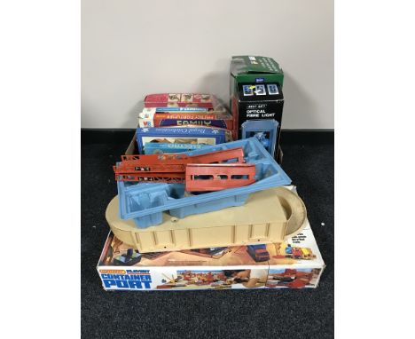 A box of board games, Dancing Santa, Fibre Optic light, Matchbox container port play set and hot wheels play set 