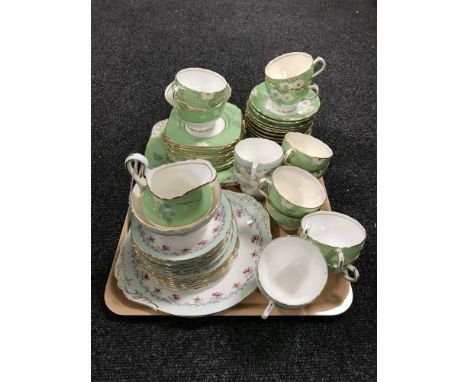 A tray of Paragon Bordeaux part tea service together with a New Chelsea part tea service 