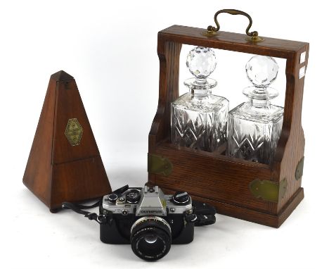 A group of collectable items comprising ; an Olympus OM10 camera, lenses and accessories, a pair of  10x50 field binoculars, 