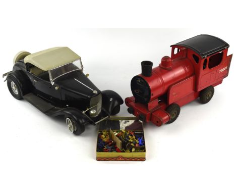 A quantity of vintage toys including ; a Corgi state Landau carriage, boxed, a Triang tinplate locomotive, length 44cm, Brita