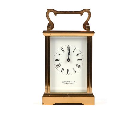 Garrard and Co. Ltd, a brass carriage clock, with white enamel dial, Roman numeral chapter room, Garrard & Co. Ltd. 112 Regen