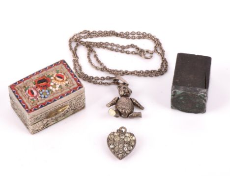 A group of costume jewellery, including a paste set deco double clip, a paste set heart pendant, silver teddy bear on a chain