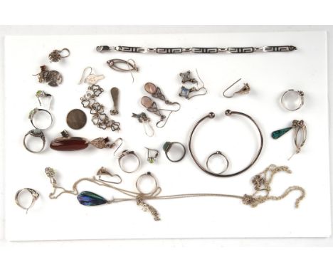 Mainly modern silver jewellery including a diamond pendant, a torque bangle, eight rings, nine pairs of earrings, two bracele