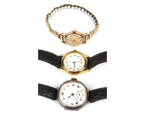 Three wrist watches consisting of an Omega ladies yellow metal wrist watch on expanding bracelet, a sterling silver manual wi