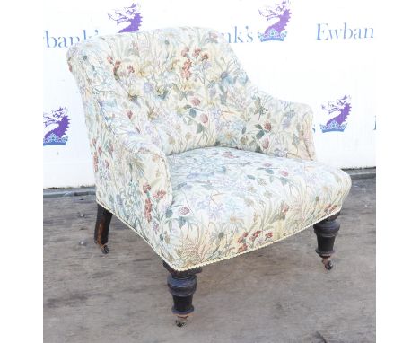 Victorian armchair, upholstered in floral material with button back design, 73cm high