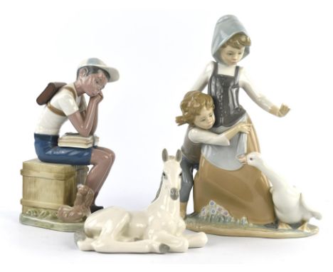 Ten Lladro porcelain figure groups including ; ' Avoiding the Goose', 'Sweet Dreams', 'Bashful Bather' and seven further grou