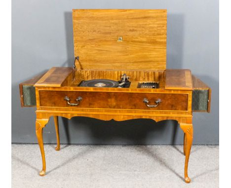 "BARGAIN HUNT" LOT.&nbsp; A figured walnut cased Garrard SP25 MK1V record player, with crossbanded top, fitted one dummy frie