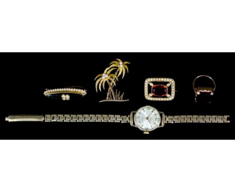 A lady's 9ct gold cased manual wind wristwatch, the silvered face with gold baton numerals, 19mm diameter, on conforming brac