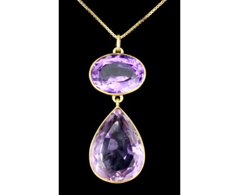 A 9ct gold mounted and amethyst pendant, set with an oval and tear shaped facet cut amethyst (approximate total weight 7ct), 