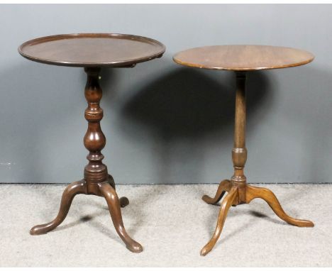 A George III mahogany circular tripod occasional table with moulded edge to top, on twin baluster turned central column and c