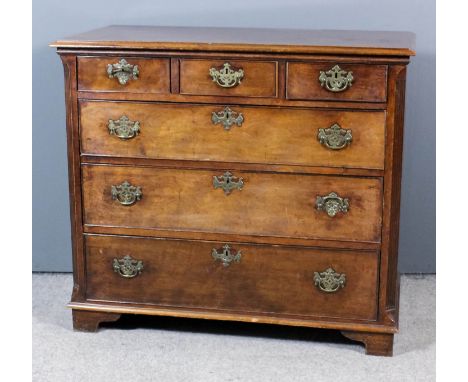 An 18th Century mahogany chest with moulded edge to top, fitted three small drawers above three long drawers with fluted cant
