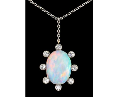 An early 20th Century 18ct white and yellow gold mounted opal and diamond oval pendant, set with central opal, 14mm x 10mm, s