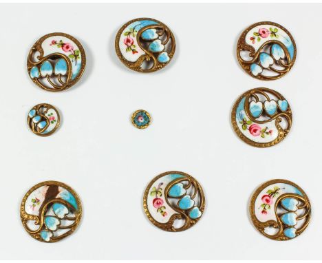 Seven French gilt metal and enamel circular buttons pierced and cast with stylised flowers and enamelled with roses, 20mm dia
