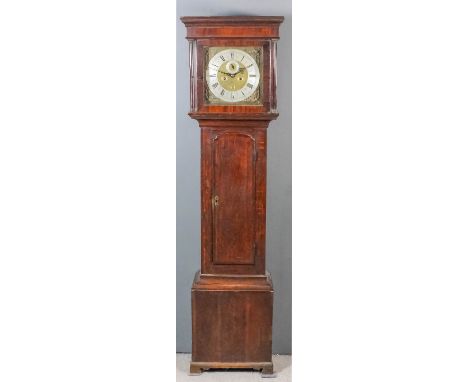 An 18th Century oak longcase clock by William Kipling of London, the 12ins square brass dial with wide silvered chapter ring 