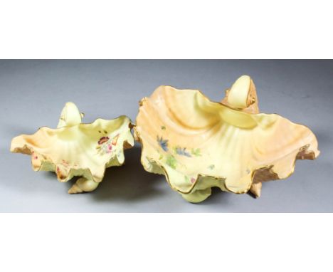 A pair of Royal Worcester blush ivory bone china silver-mounted salad bowls, moulded with shells, 10ins x 4ins high, a blush 