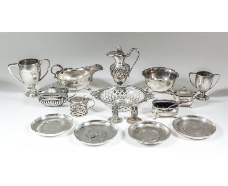 A Victorian silver miniature ewer cast with fruiting vine pattern finial and fruiting vines to body, leaf capped scroll handl