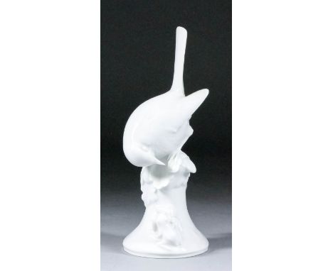 A 20th Century Meissen white glazed porcelain model of a bird perched on a rock and a frog, possibly modelled by Walther, 6.7