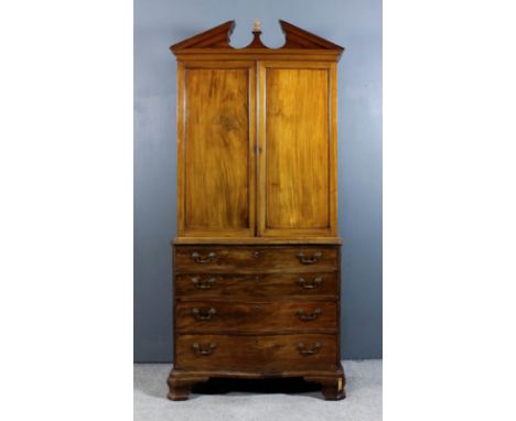 A George III mahogany serpentine fronted chest with moulded edge to top, fitted four long graduated drawers, on ogee bracket 