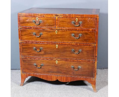 A late George III mahogany chest with square top edge inlaid with wide satinwood and rosewood bandings, fitted two short and 