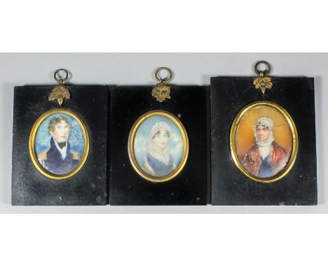 Early 19th Century English school - Pair of miniature half length portraits of Captain William Mores and his wife, 2.75ins x 